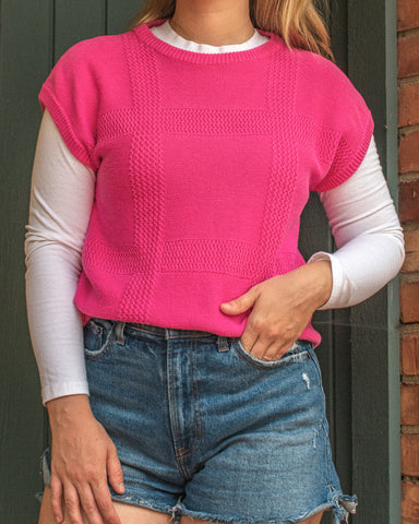 Pink sweater vest