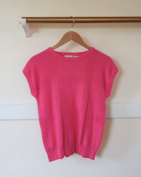 Pink sweater vest