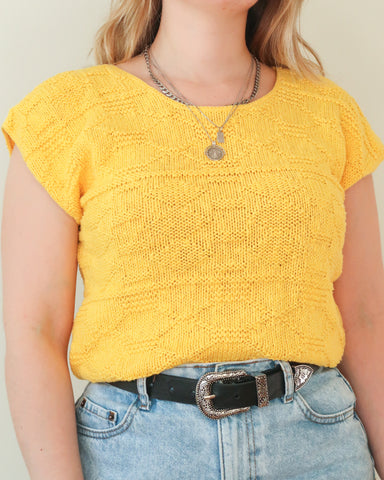 Yellow sweater vest