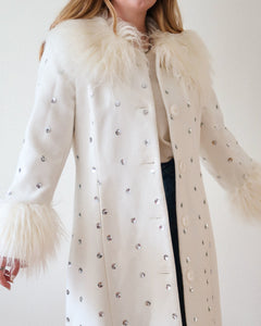 White faux fur coat